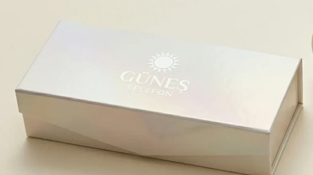 Sedef selefon kaplanmış Güneş Selefon logolu karton kutu